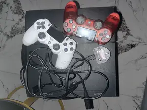 NEATLY USED PS4 Fat With 2 Controllers