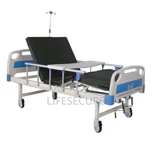 High Quality Hospital Bed With Strong Casters, IV Pole and Table Top