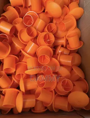 High-Visibility Orange Plastic Rebar Caps