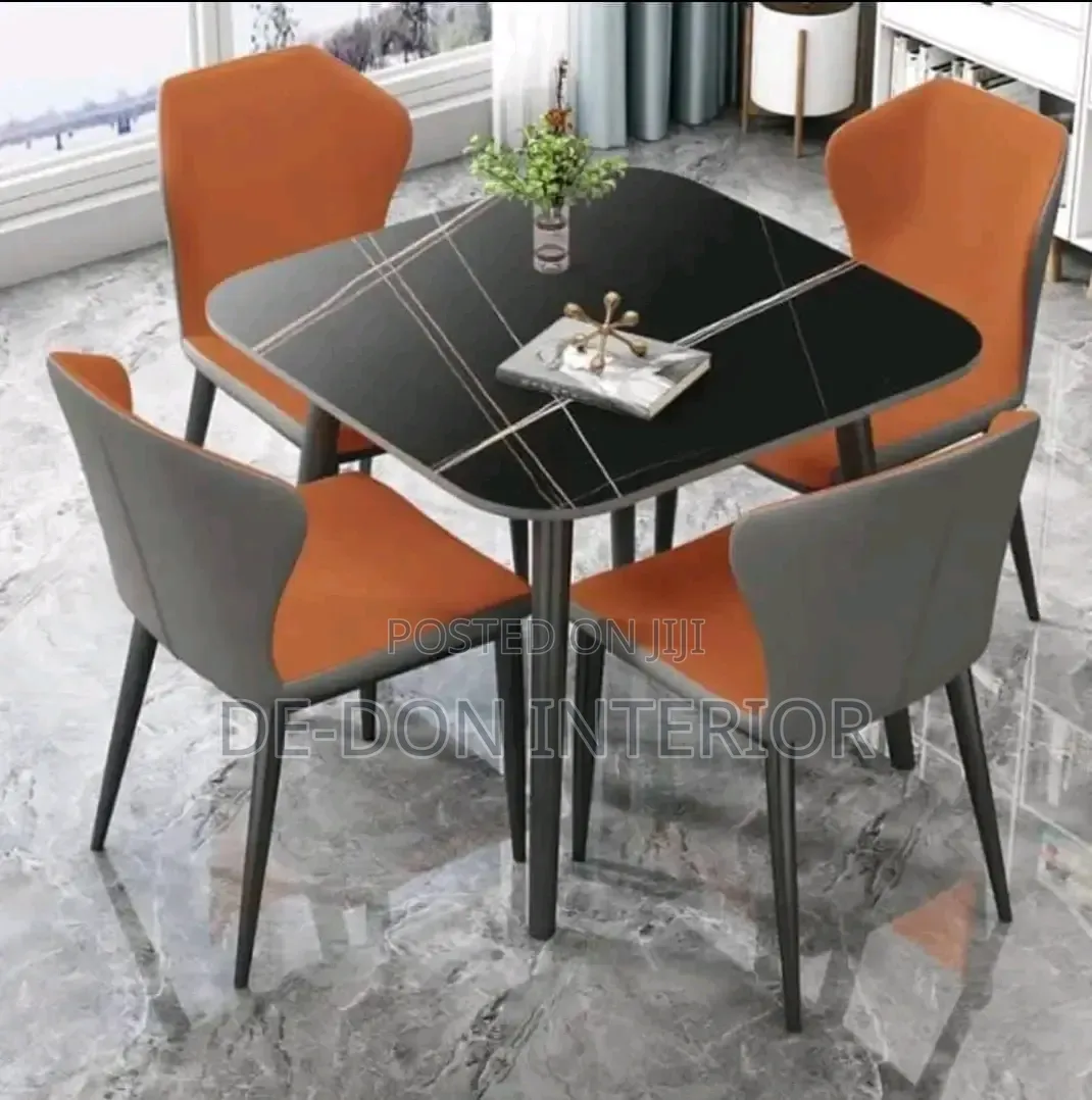 Ceramics Dinning Table With Four Sitters