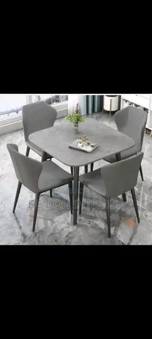 Ceramics Dinning Table With Four Sitters