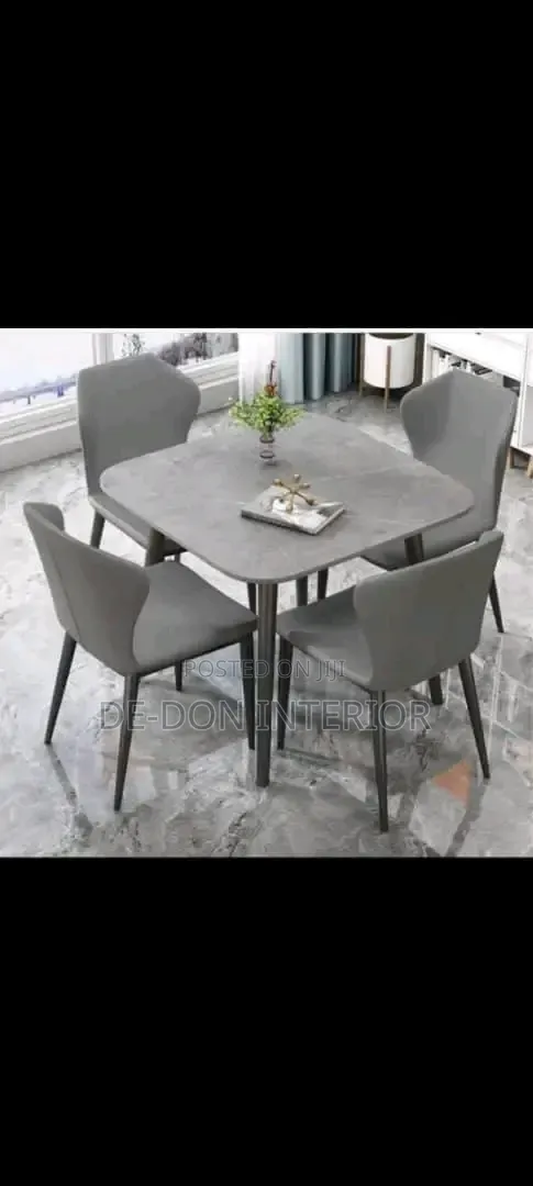 Ceramics Dinning Table With Four Sitters