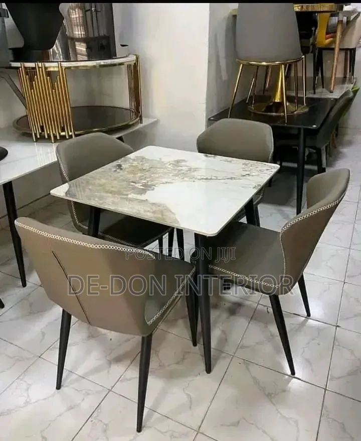 Ceramics Dinning Table With Four Sitters