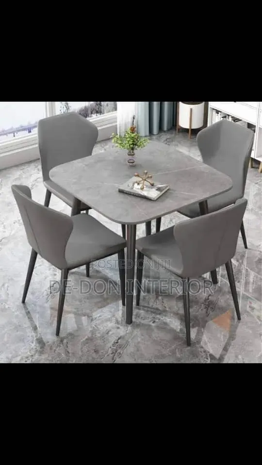 Ceramics Dinning Table With Four Sitters