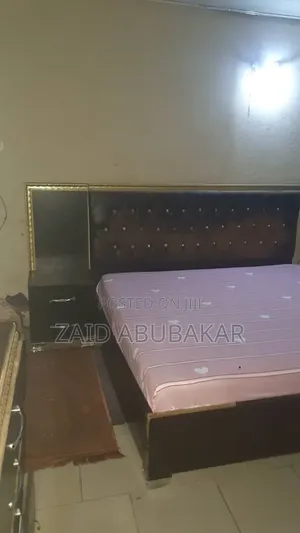 Bed, Mirror Drawers and Side Drawers With Wardrobe.