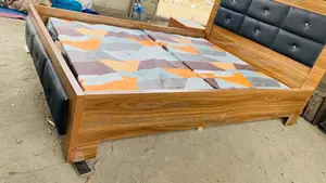 Bed Frame 4 and Half by 6 With Padded Sheets