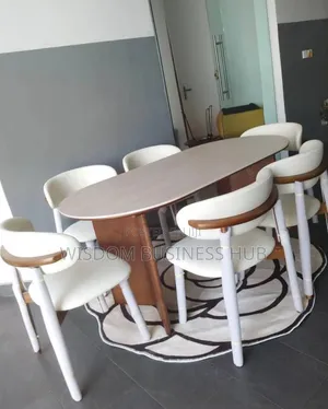 Mid-Century Oval Dining Table With Comfortable Padded Seats
