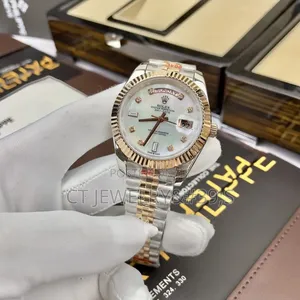 Rolex Day-Date Features a Two-Tone Steel and Rose Gold Diamond Dial.