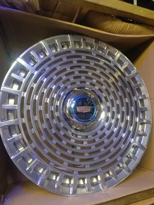 22ich Cadillac Chrome Wire Wheel Cover Featuring a Prominent Center