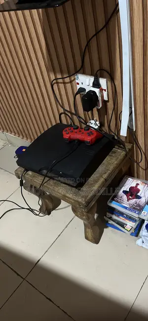 PS3Slim320GBJailbroken2OriginalControllers10gamesinstalled11gamediscs