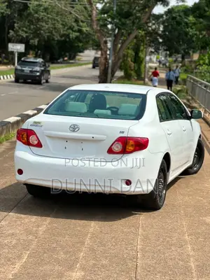 Toyota Corolla XLE 4dr Sedan (1.8L 4cyl 4A) 2009 White