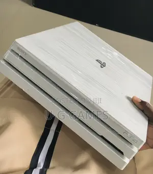 Clean Ps4 Pro Uk Used One Pad and Games Installed 10.0