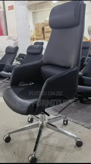 High-Back Ergonomic Black Leather Executive Office Chair With Headrest