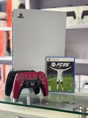 PS5 With Two Controllers and FC25