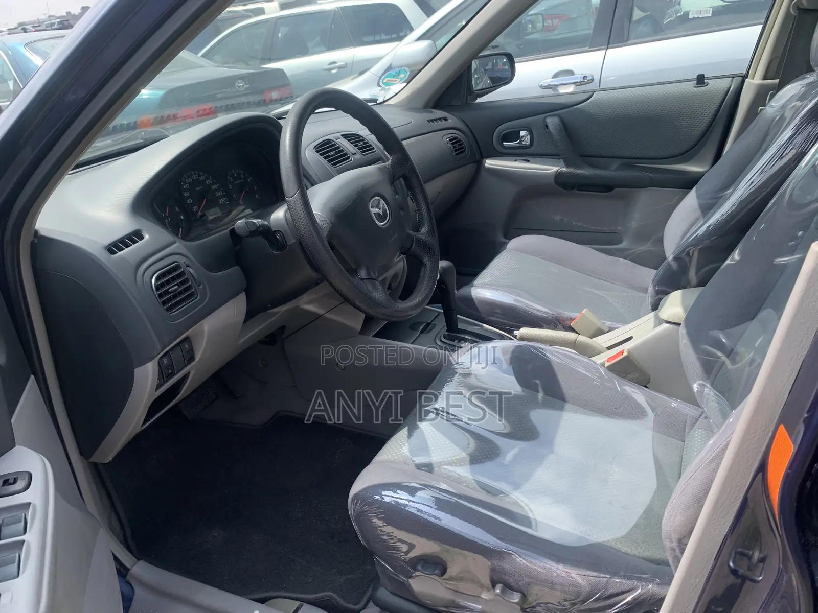 Mazda 323 2004 Blue