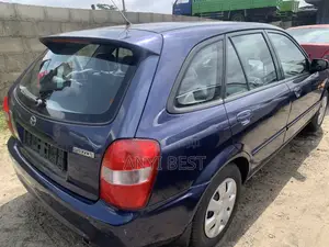 Mazda 323 2004 Blue
