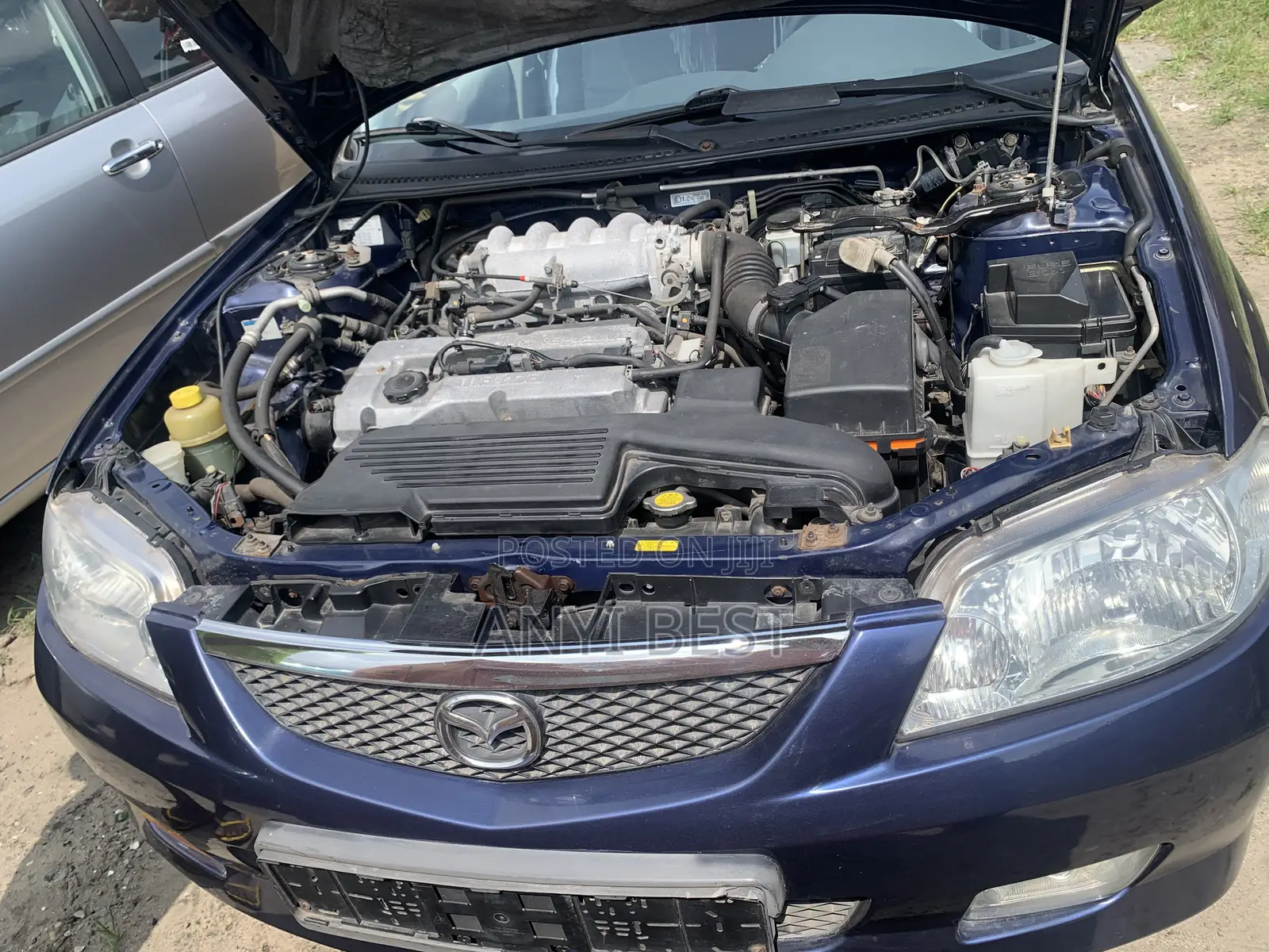 Mazda 323 2004 Blue