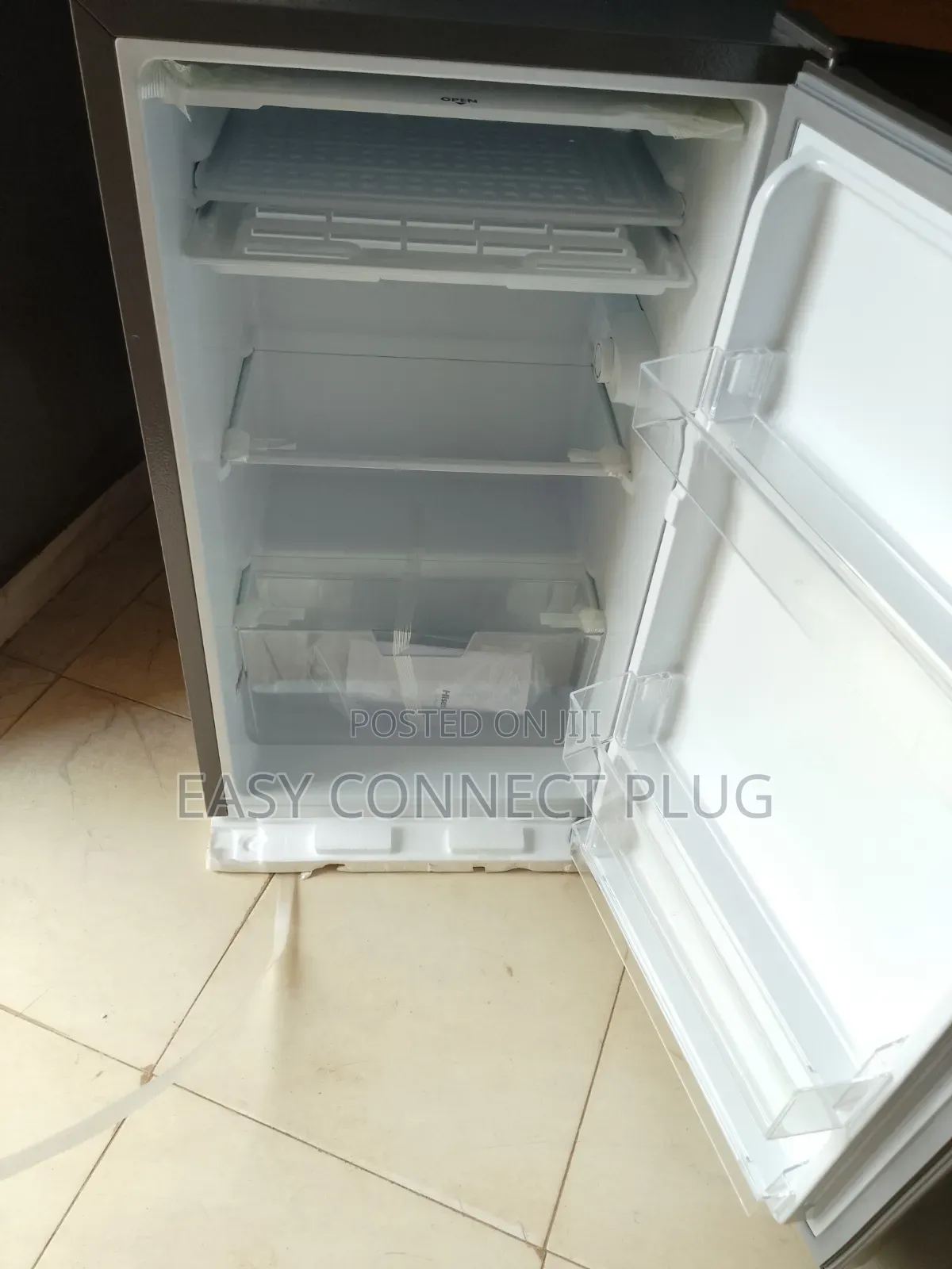 Available Hisense Silver 90 Liters Refrigerator.