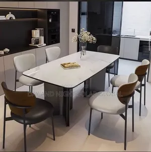 Luxurious Dining Table With 6 Sitters Chairs