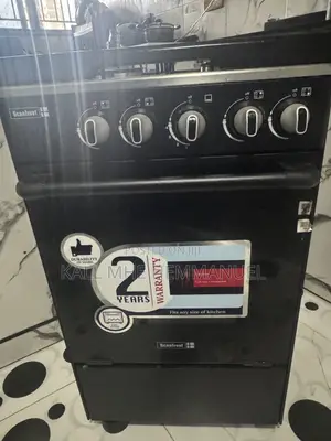 Standing Gas Cooker Four Burners and an Integrated Oven