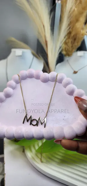 Mom Engraved Gold Titanium Necklace