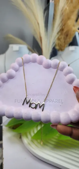 Mom Engraved Gold Titanium Necklace