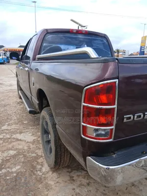 Dodge RAM 1500 Quad Cab 4x4 Laramie 2005 Brown
