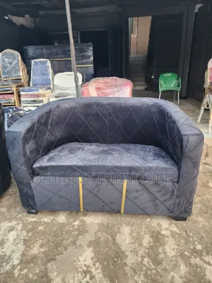 Double Seater Upholstery Padded Sofa.
