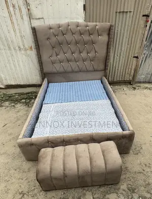 4.5 by 6 Upholstery Bedframe With an Ottoman