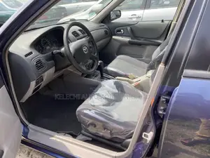 Mazda 323 2004 Blue