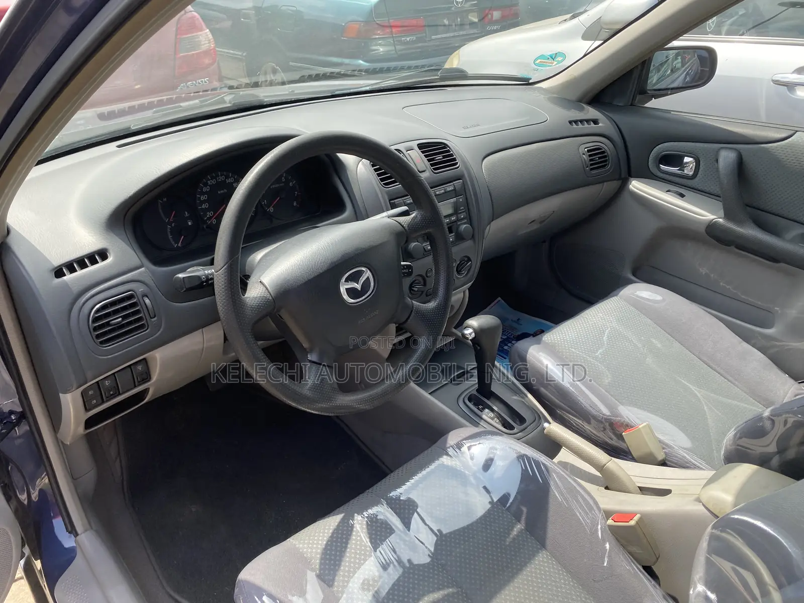 Mazda 323 2004 Blue