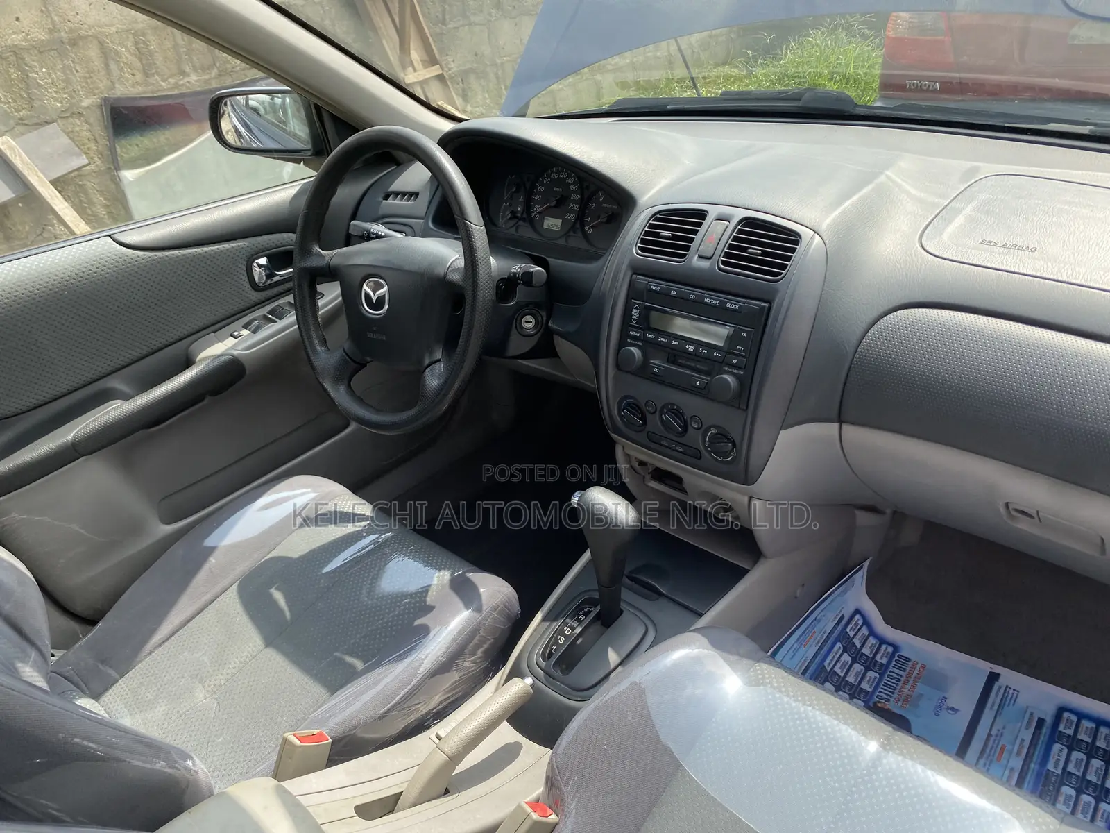 Mazda 323 2004 Blue