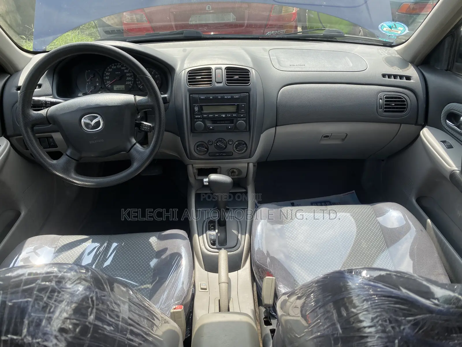 Mazda 323 2004 Blue