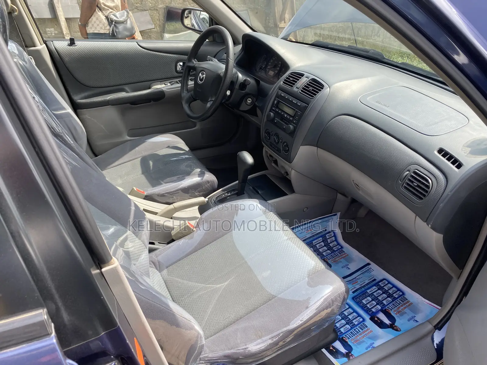 Mazda 323 2004 Blue