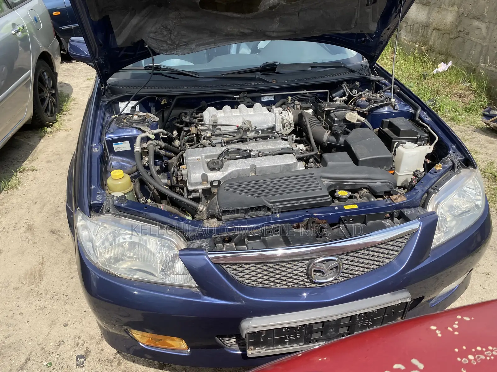 Mazda 323 2004 Blue