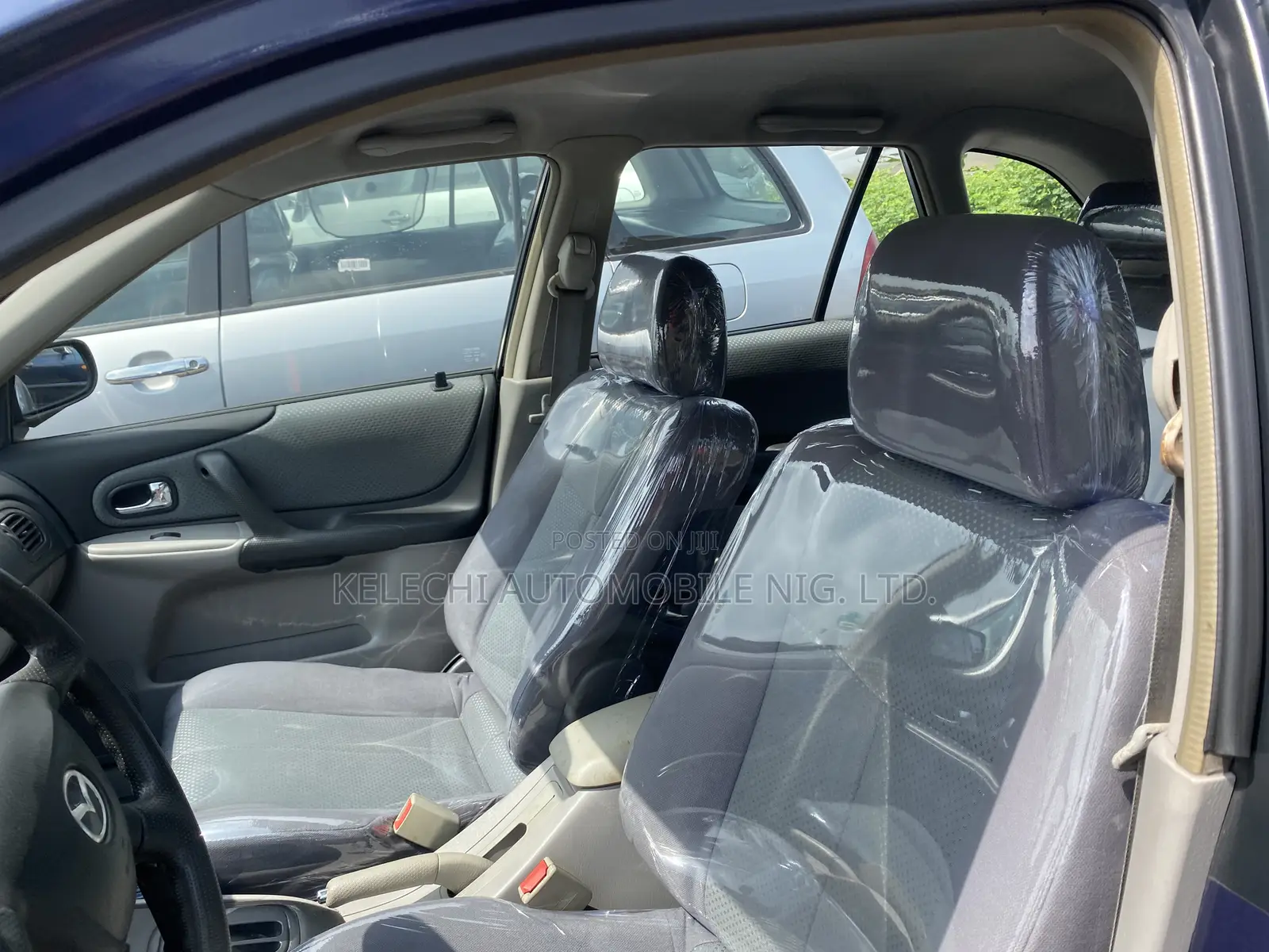 Mazda 323 2004 Blue