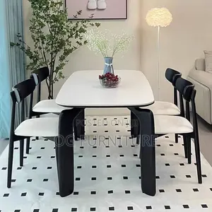 A Standard Luxury Marble Dinning With 4 Luxury Chairs .
