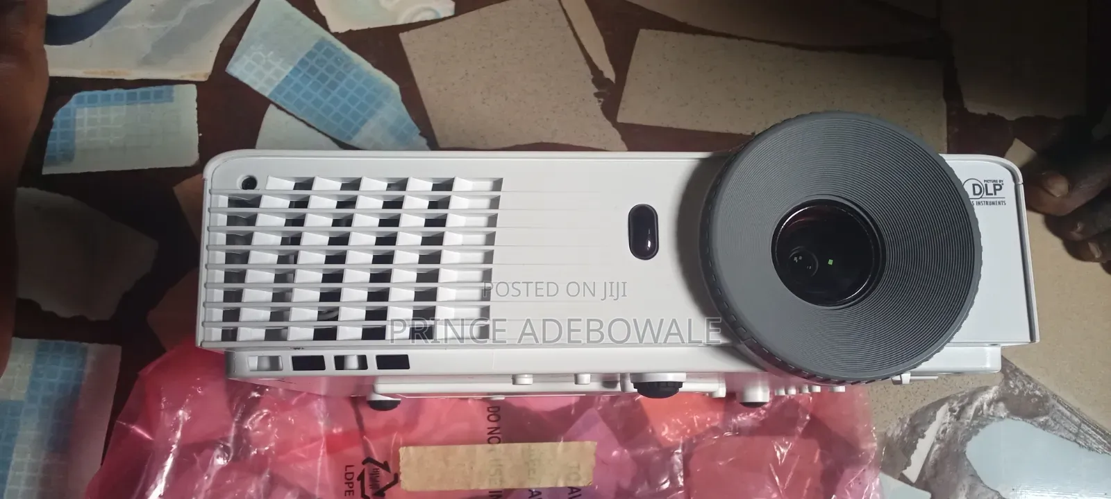 A LG Be320 Projector.
