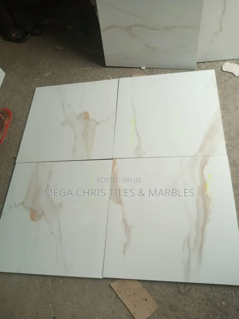 60x60 Carara Gold , Spanish.
