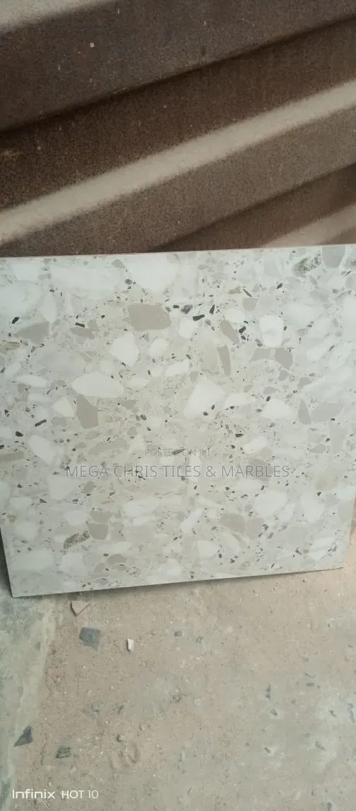60x60 Carara Gold , Spanish.