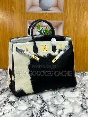 Statement Cowhide Top-Handle Bags