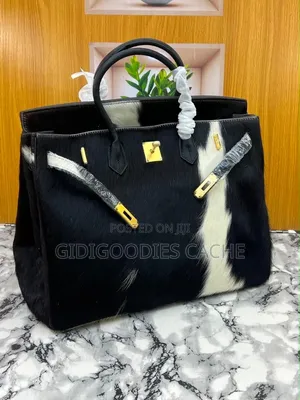 Statement Cowhide Top-Handle Bags