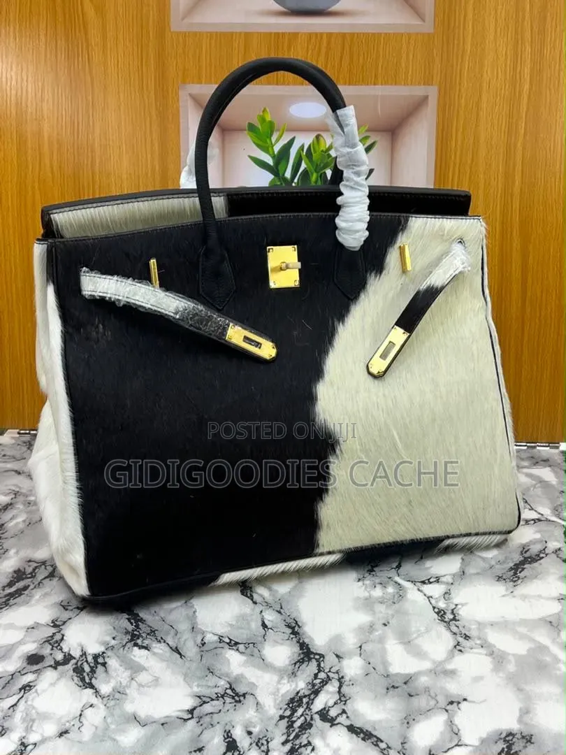 Statement Cowhide Top-Handle Bags