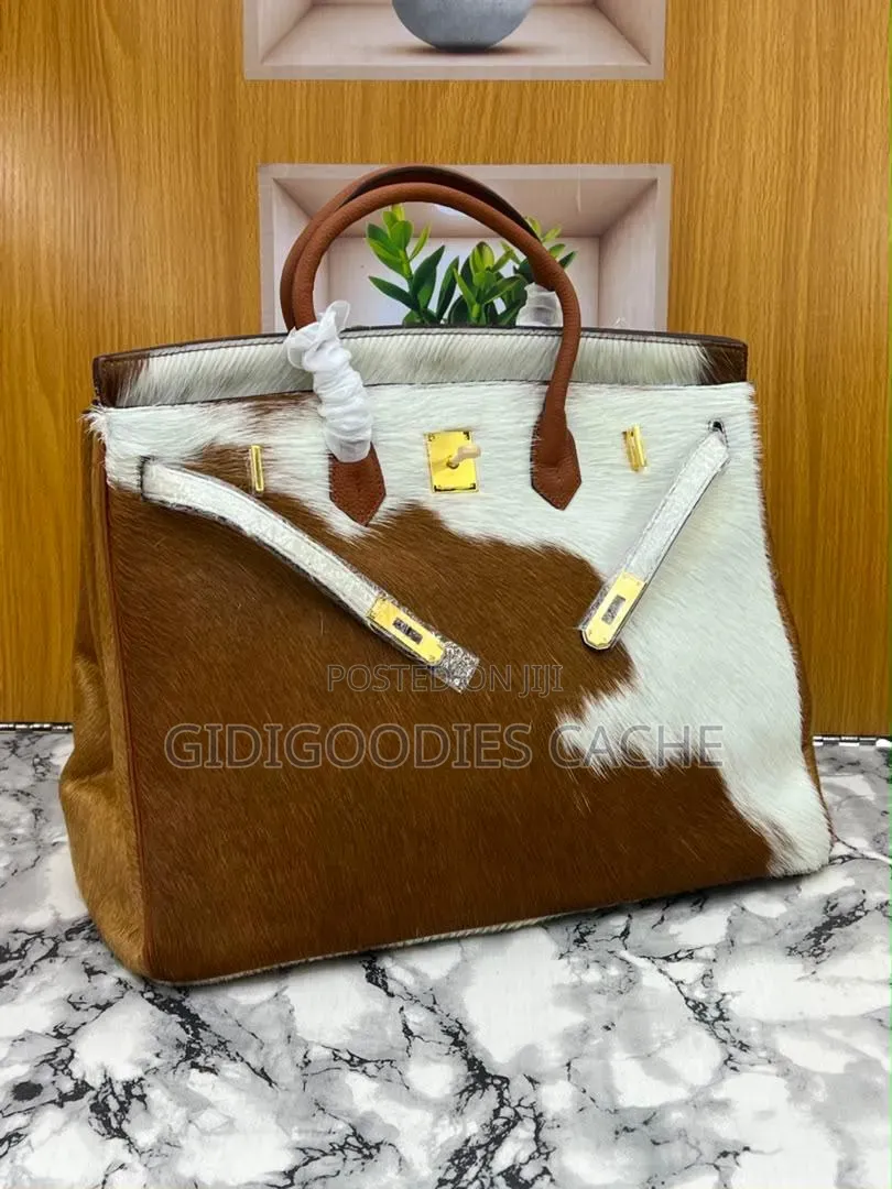 Statement Cowhide Top-Handle Bags