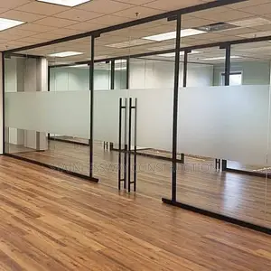 Office Glass Partitioning With Black Accessories and Borderline In