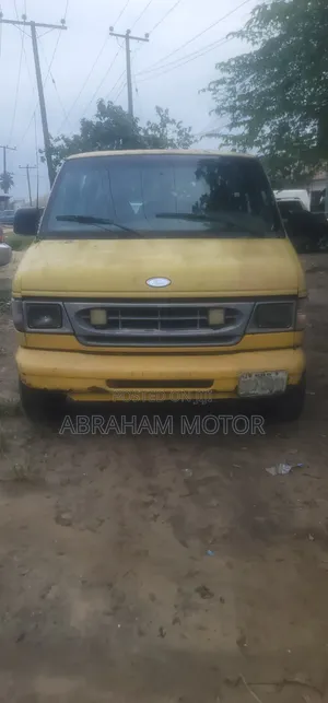 Ford E250 2001 Yellow