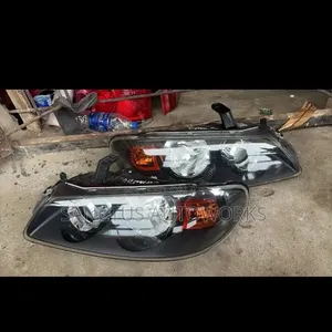 Headlight Nissan Almeratino 2005
