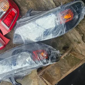 Headlight Nissan Almeratino 2005