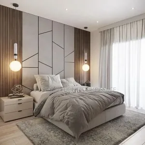 High Padded Bedframe With Wall Design