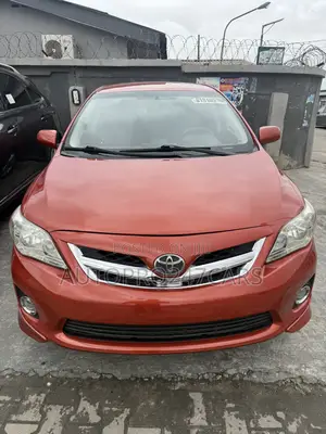 Toyota Corolla LE 4dr Sedan (1.8L 4cyl 4A) 2013 Orange